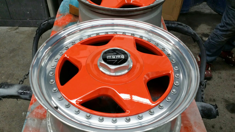 Freshly painted orange wheels.